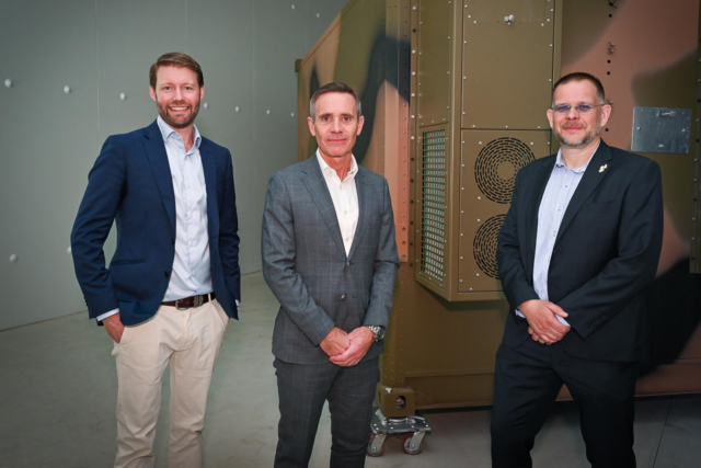 Defence SA Chief Executive Matt Opie (centre) touring Cold Logic's new Wingfield headquarters, where the company's high-performance industrial refrigeration chamber is housed.