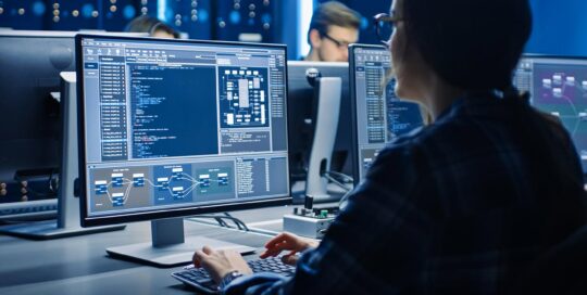 Cyber - Major Project - woman working at a computer