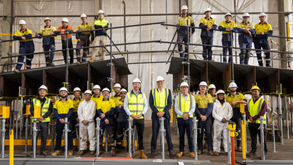 A group photo of people from two South Australian employers working on a project
