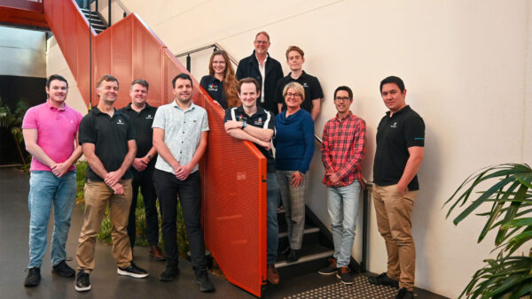 Front row from left: Hamish Earl, Dr Clayton Locke, Dr Fred Baynes, Dr Andy Boes, Dr Ashby Hilton, Dr Margaret Law, Dr Nicolas Bourbeau Hebert, Dr Sebastian Ng. Back row from left: Dr Elizaveta Klantsataya, Professor Andre Luiten, Dr Reuben Harding. Sourced from Defence Trailblazer.