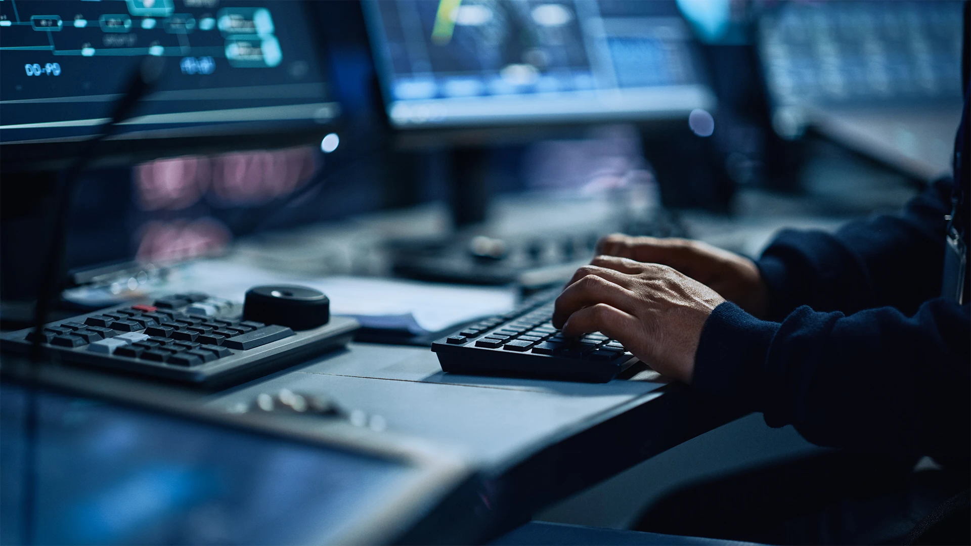Close up of a person typing on a computer keyboard